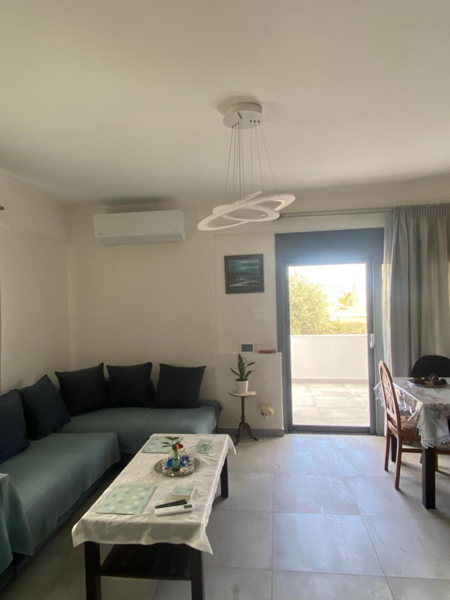 Appartement Οι Ακτινες Του Ηλιου à Agios Spyridon  Extérieur photo